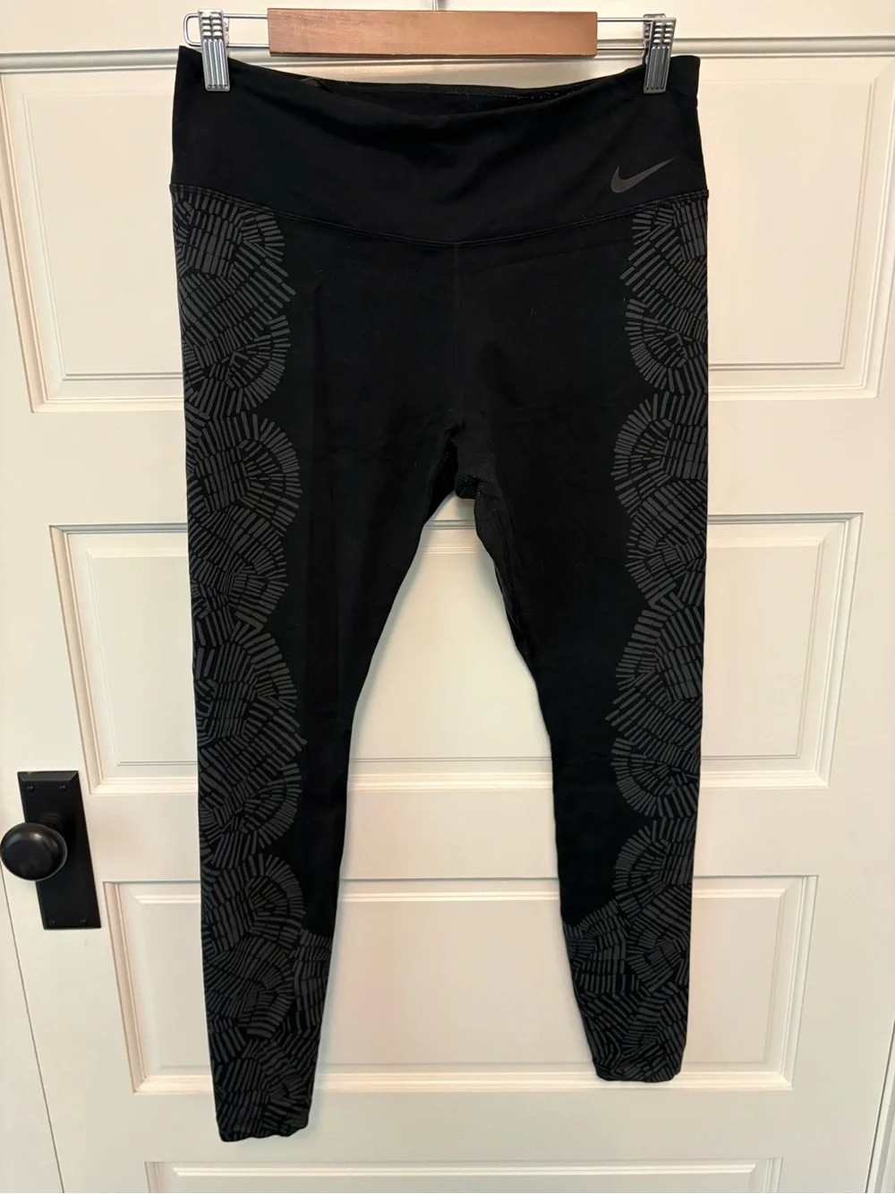 Nike Black Leggings with Subtle Patterned Side Panels